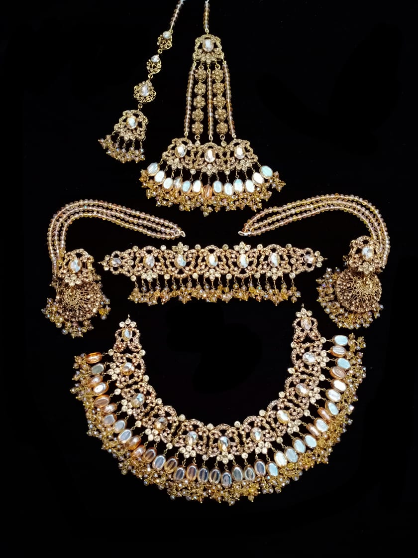 Latest Gold Jewellery Design For Wedding in Champagne Color