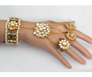 FLORAL BRACELET ATTACHED TO RINGS